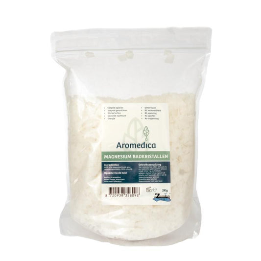 Aromedica magnesium bath crystals in a 2kg bag, suitable for bath and shower, with natural mineral appearance and packaging.