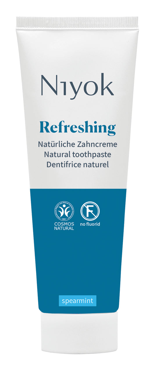 Niyok refreshing spearmint toothpaste in a 75ml tube, with spearmint flavor and dental care branding.