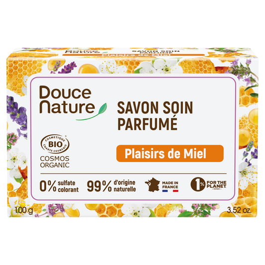 Douce Nature Honey Pleasure Zeep soap bar with honey scent, rectangular shape, wrapped in natural paper packaging.