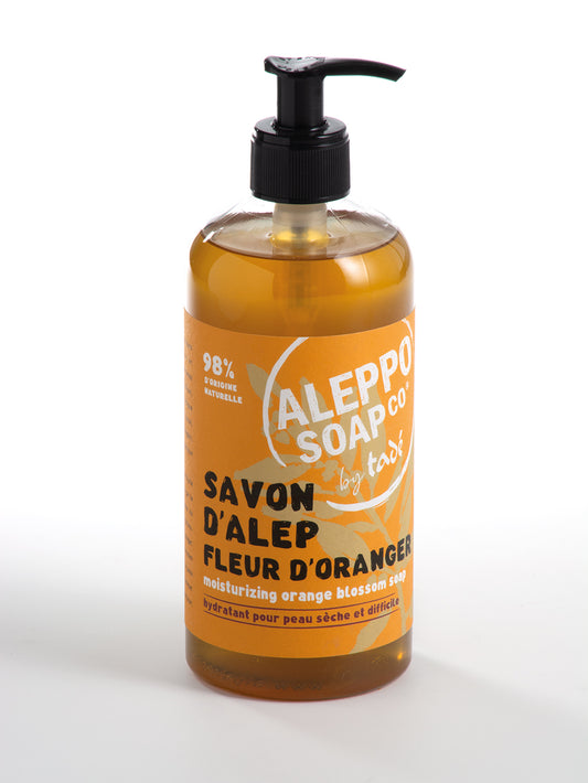 Aleppo Soap Co Sinaasappel soap pump with 500ml orange-scented natural zeep in a clear plastic pump bottle.