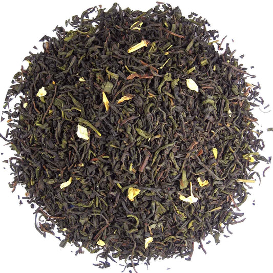 Geels Earl Grey tea in a 1kg package, featuring a box with the brand logo and a steaming cup of tea with lemon and tea leaves.