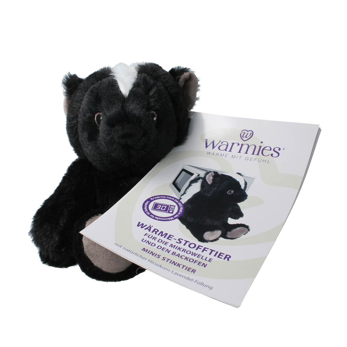 Warmies Stinkdier mini herbal heat pack in a small ceramic mug, featuring a playful cartoon character design.