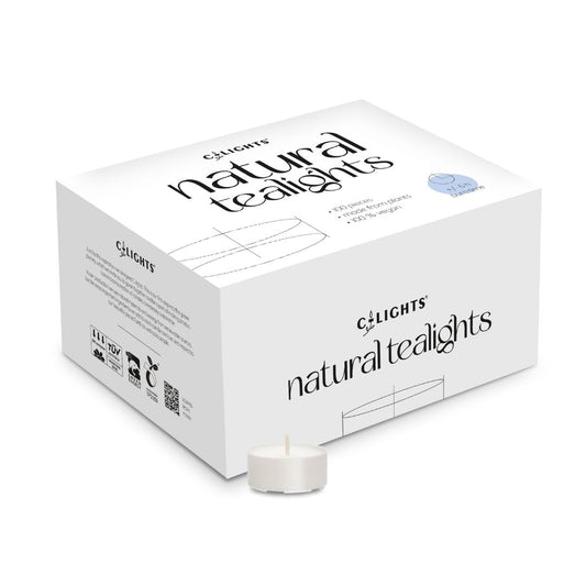 C-lights natural tealight candles in a box of 100, providing 6 hours of warm ambient light.