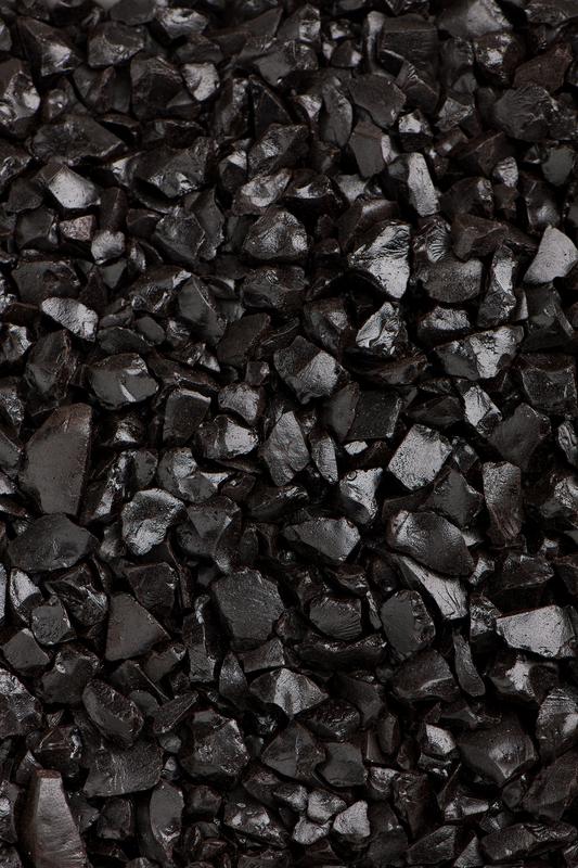 Sirea Laurier frantumata snoepgoed in 1 kilogram bag, colorful crushed licorice candies on a white background.