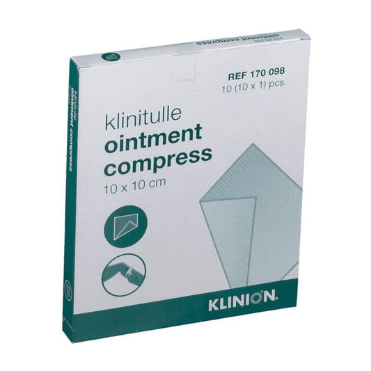 Klinion Klinitulle zalfkompres 10x10 cm, pack of 10 sterile gauze and compresses for wound care on a clean surface.