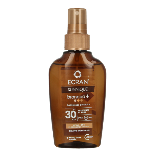 Ecran Sunnique aceite broncea+ SPF30 sun tanning oil bottle, 100ml, with label and cap visible.