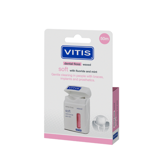 Vitis Floss soft waxed expanding dental floss in pink, 50 meters, used for oral hygiene and teeth cleaning.
