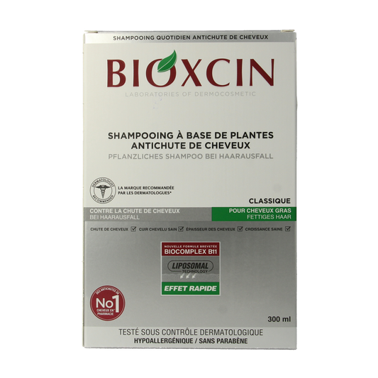 Bioxcin shampoo bottle for hair care, 300 ml, with label displaying brand and product details, on a white background.
