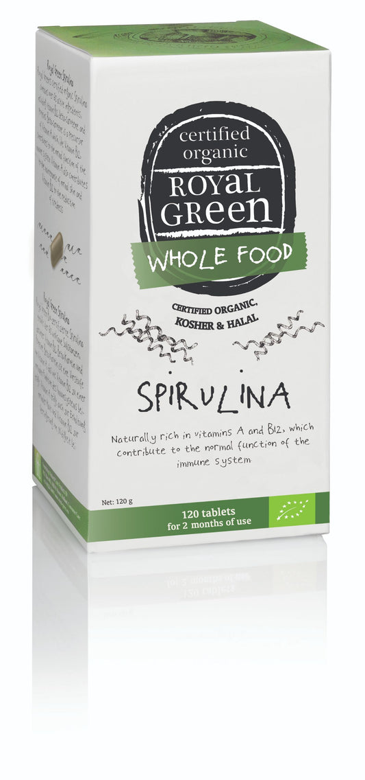 Royal Green Spirulina bio tablets in a bottle, showing the label and green tablets inside, part of herbal supplement products.