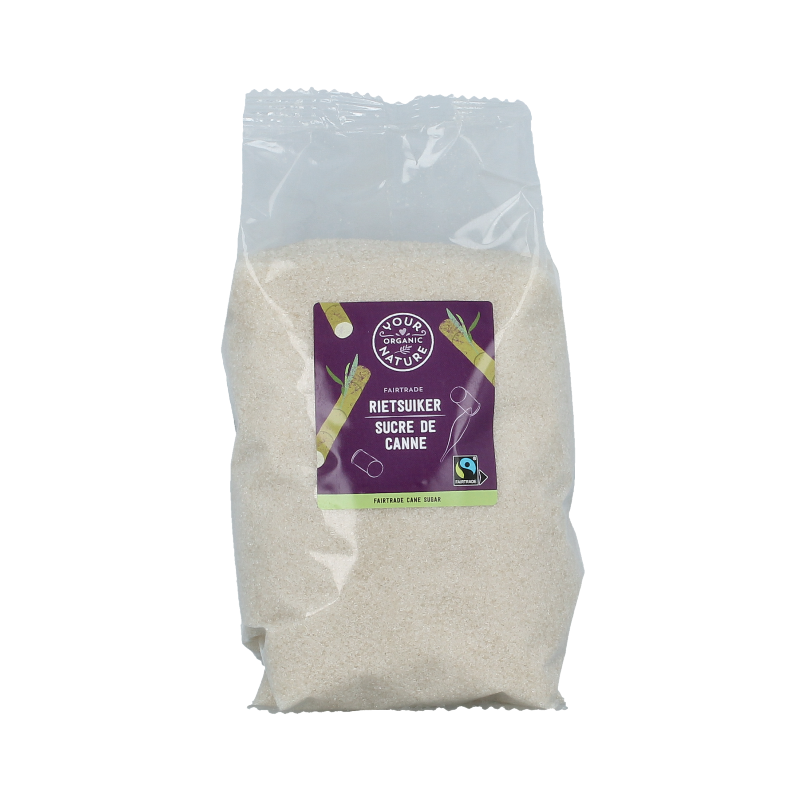 Organic brown sugar from Your Organic Nature, 1 kilogram package, showcasing the textured, natural sugar crystals.