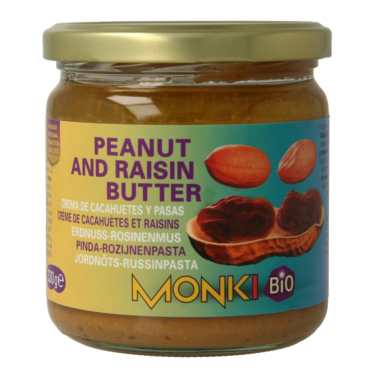 Organic Monki Pinda rozijnenpasta spread on bread, showing a jar of peanut and raisin paste from Monki.