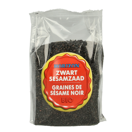Horizon black organic sesame seed spread on bread, close-up of dark sesame seeds in a jar for healthy breadbeleg.