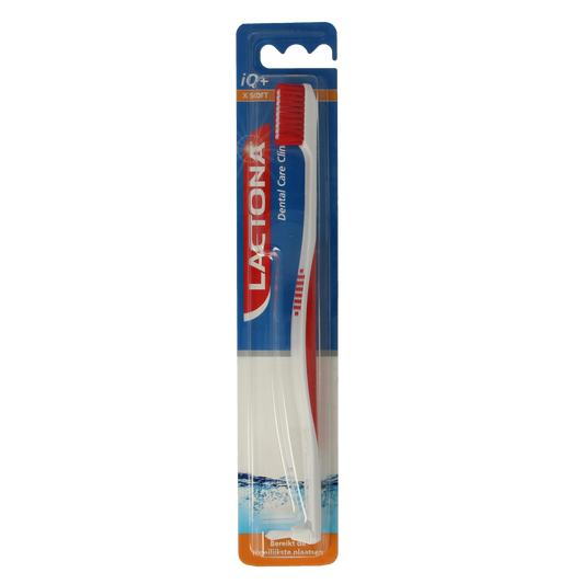 Lactona IQ+ X-Soft toothbrush with white handle and soft bristles, designed for gentle cleaning, shown in close-up.