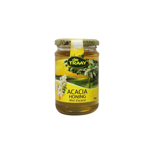 De Traay Acaciahoning in a jar, smooth golden honey with a natural pour, showcasing the premium acacia honey brand.