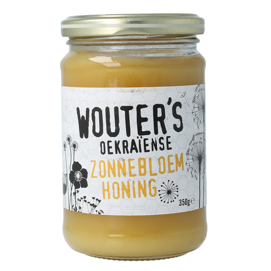 de Traay Wouters Oekraiense zonnebloemhoning in 350g jar, smooth golden honey with sunflower flavor and natural texture.