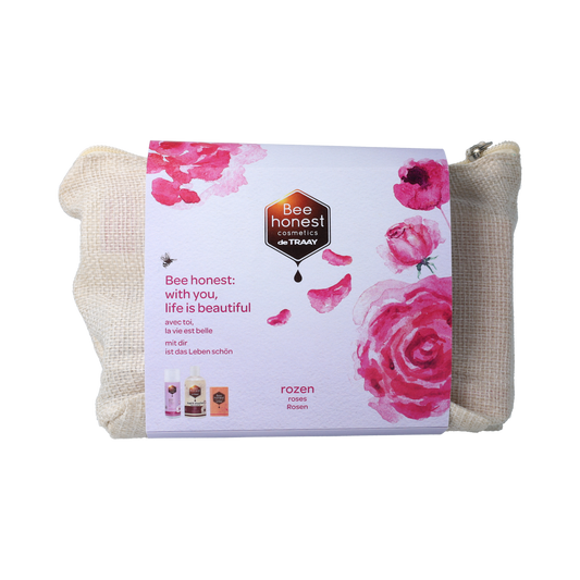Traay Bee Honest gift set with rose-themed body care products, including packaging and floral accents, in a natural presentation.