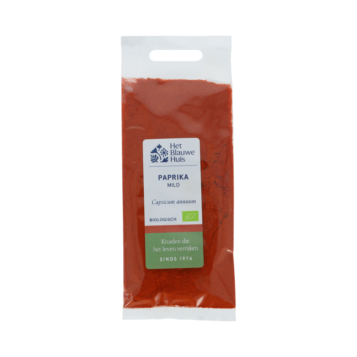 Organic mild paprika powder from Het Blauwe Huis, 30g jar, showing vibrant red spice in a clear glass container.