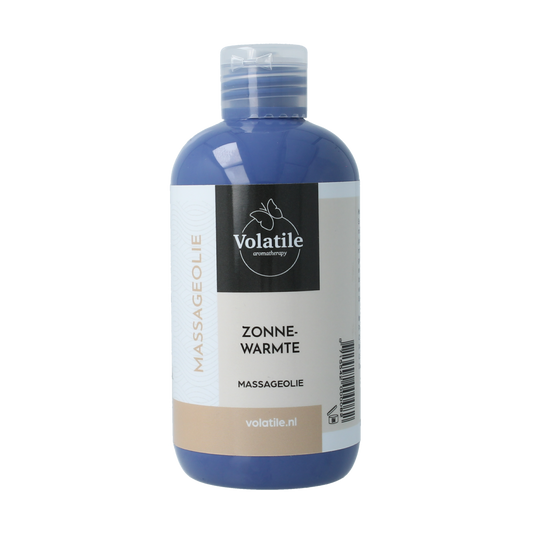 Volatile massage oil with warm sun mandarin and myrrh, 250ml, natural body care product in a clear bottle with a golden cap.