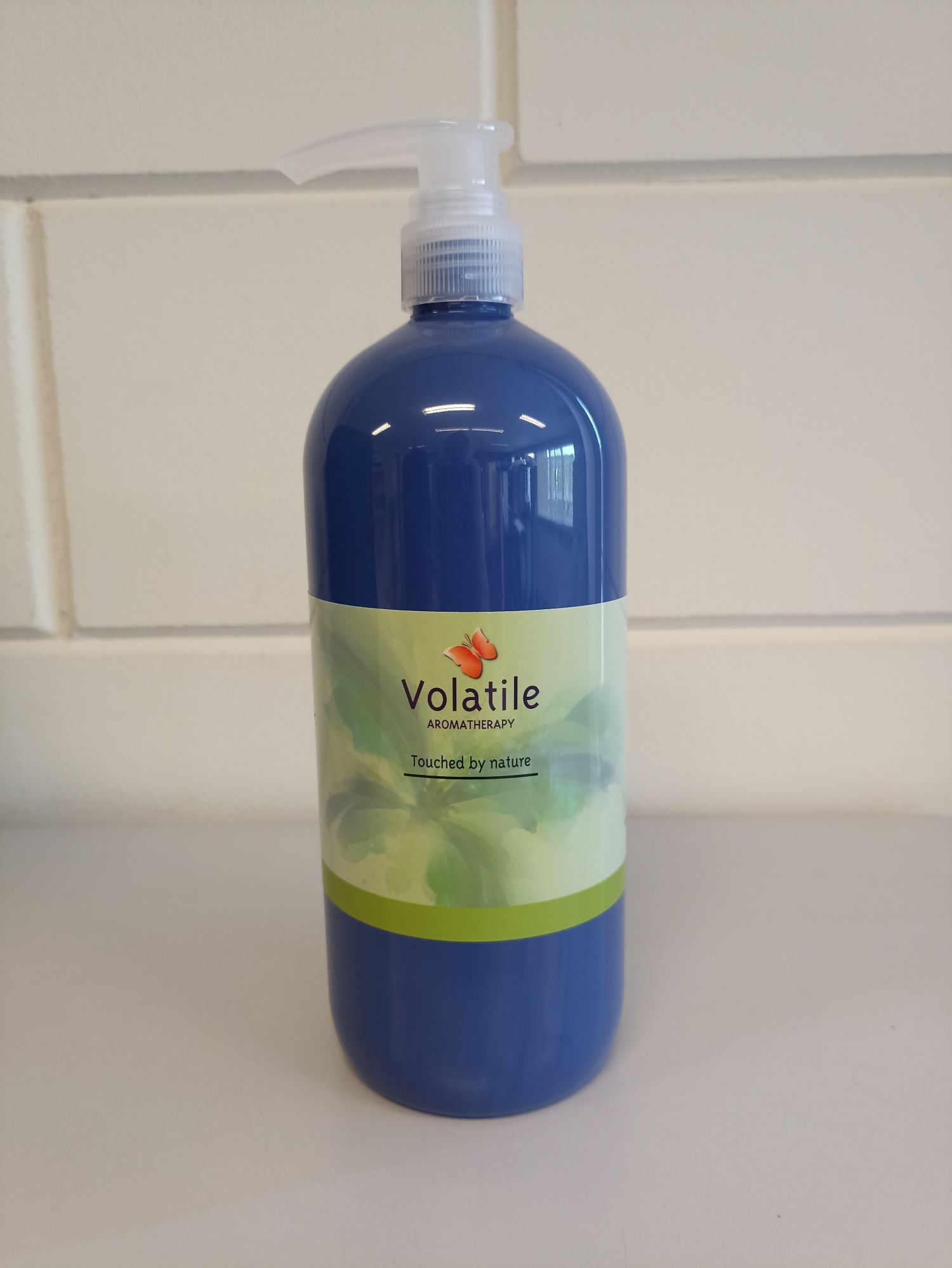 Volatile Sesam Massage Oil for sore muscles, 1000ml, body care product with natural ingredients and soothing massage properties.
