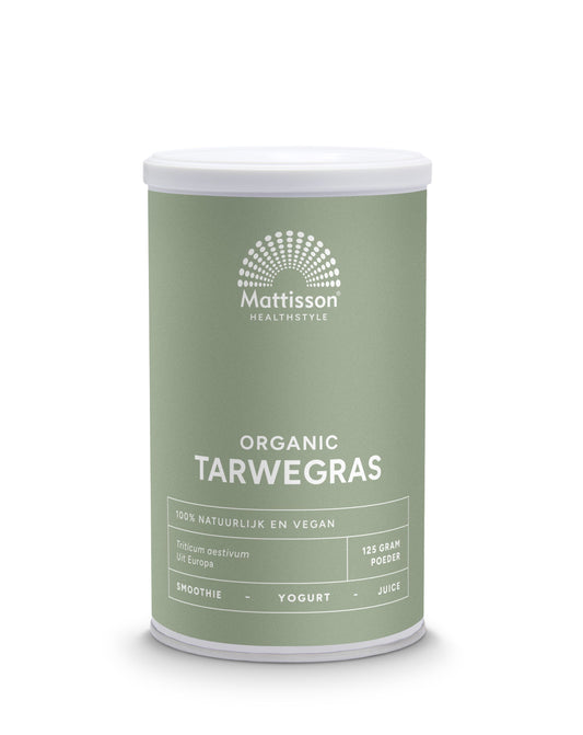 Organic wheatgrass powder in a jar from Mattisson, showcasing fresh green wheatgrass in a natural herbal supplement container.