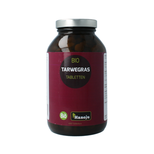 Hanoju Tarwegras glass flask with 600 organic wheatgrass tablets, herbal supplement in a clear glass container.