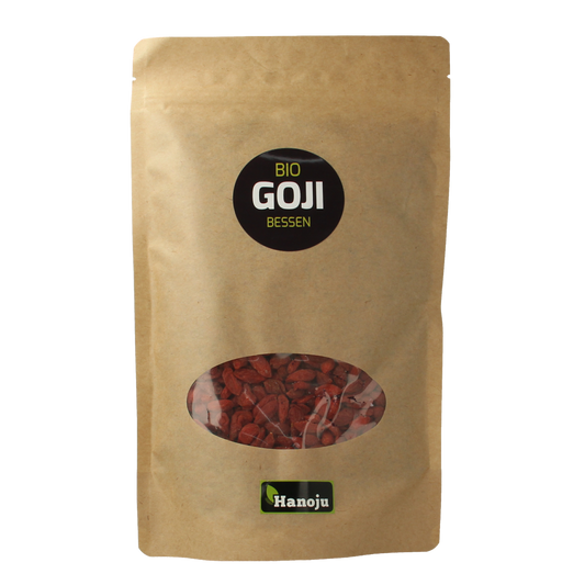Dried organic goji berries in a 500g package from Hanoju, displayed in a clear container with vibrant red berries.