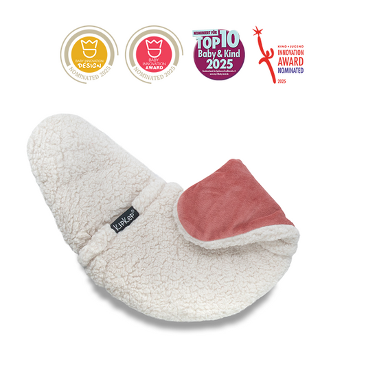 KipKep Lexie heating pillow in dusty clay teddy fabric, soft cushion for comfort and warmth.