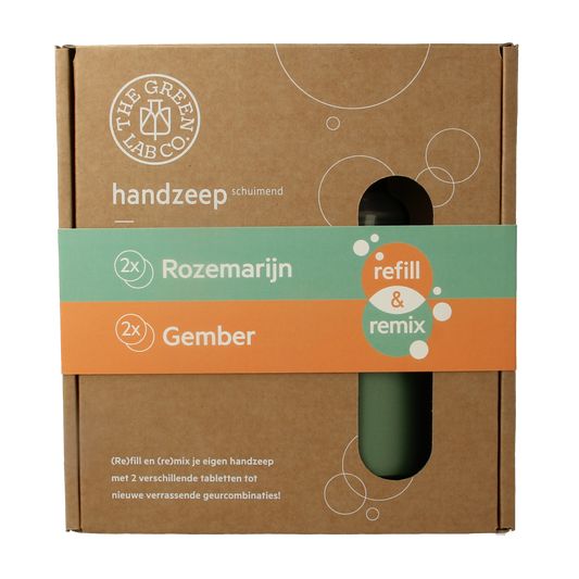 The Green Lab Co Handzeep premium starterset with rosemary and ginger, featuring elegant hand care bottles in a natural setting.