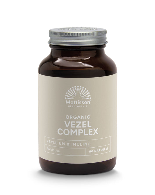 Container of Mattisson Organic Vezelcomplex bio capsules with 90 capsules, herbal supplement in a white bottle with a label.