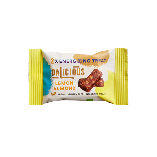 Dalicious Organic Lemon Almond Treats snack package, 30g, with lemon and almond ingredients visible on the label.
