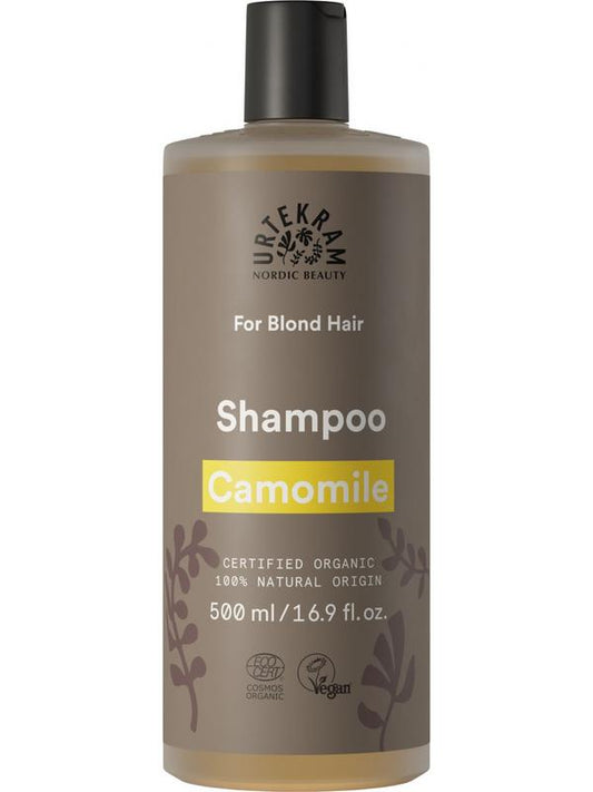 Urtekram Kamille shampoo bottle for hair care, 500ml, with a natural, gentle formula for healthy hair and scalp.