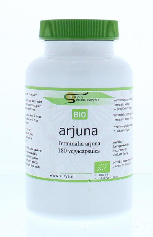 Surya Arjuna bio capsules in a bottle, herbal supplement from Surya for cardiovascular health, with a label showing capsule details.