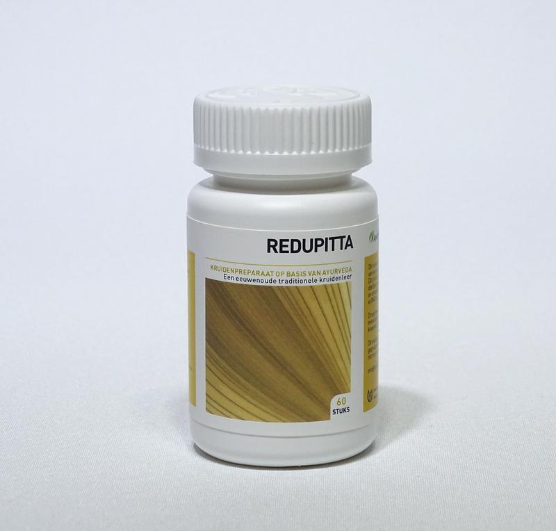 Ayurveda Health Redupitta herbal supplement tablets in a bottle, part of Ayurveda herbal preparations.