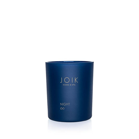 Joik Organics vegan scented candle in a 150g jar with a warm, cozy glow and natural packaging.