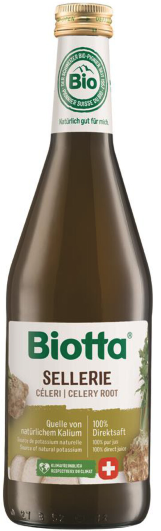 Biotta organic celery juice in a 500ml bottle, clear glass with fresh celery stalks inside, label visible on the front.