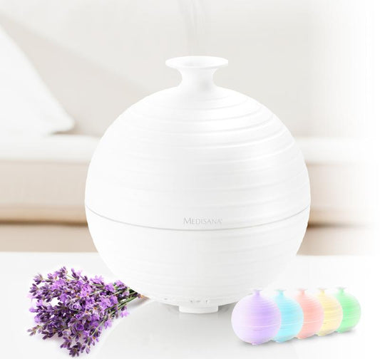 Medisana AD620 Aroma diffuser, a compact ultrasonic scent dispenser for home aromatherapy, shown with mist and subtle design features.