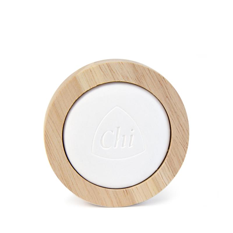 Chi Aromastone wood scent diffuser with one piece, natural wood design for aromatic fragrance diffusion.