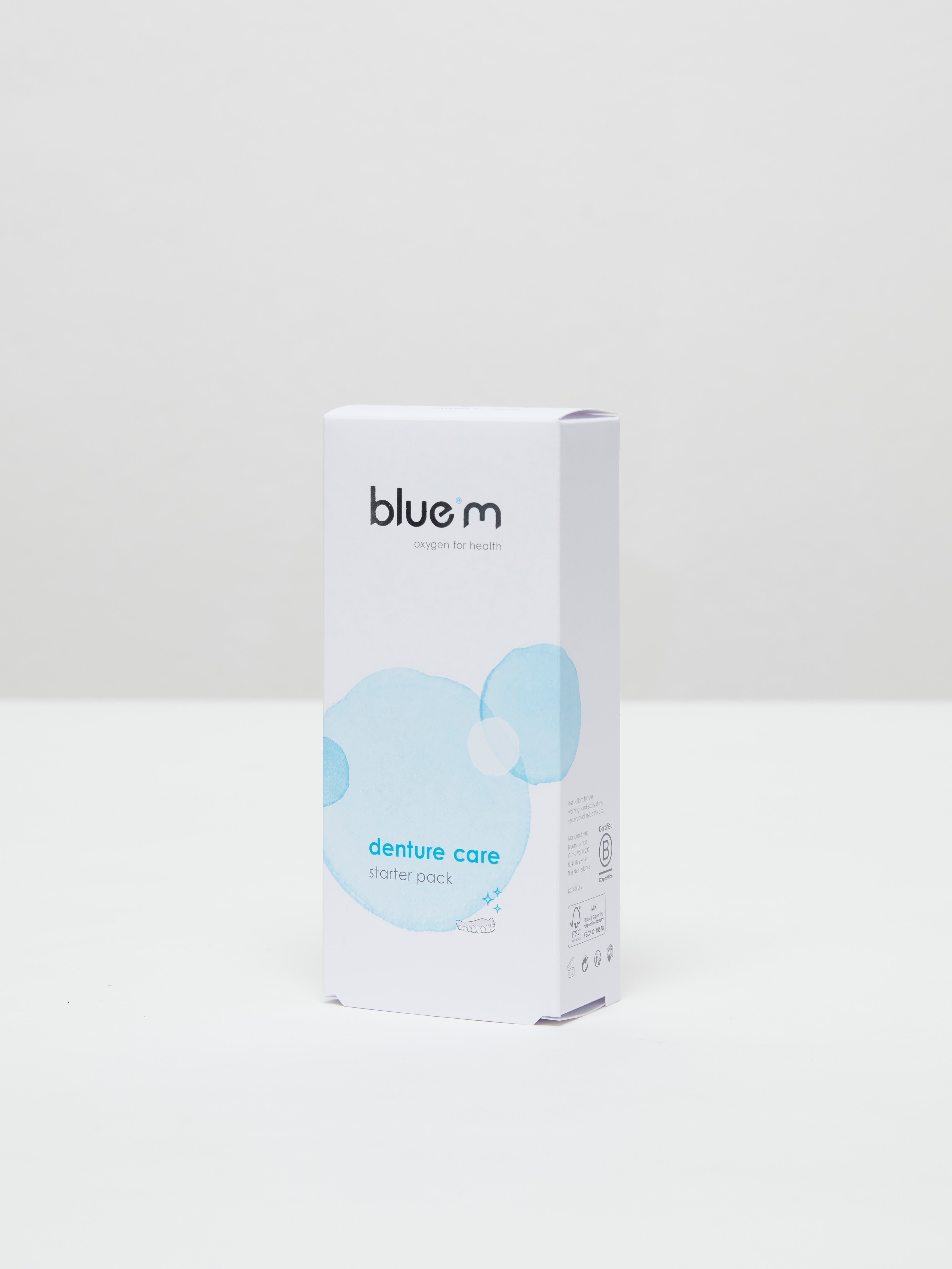 Bluem denture care pack with 24 pieces, showing cleaning tablets, brushes, and storage containers for prostheses.