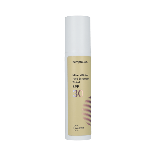 Hemptouch Mineral Shield Face Sunscreen SPF30 tinted in a 50ml tube, offering mineral sun protection with a tinted finish.