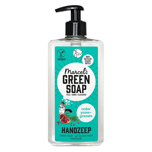 Marcel's Green Soap Cedar & Pomegranate hand soap in a 500 ml pump bottle, featuring a clear liquid with cedar and pomegranate scent.